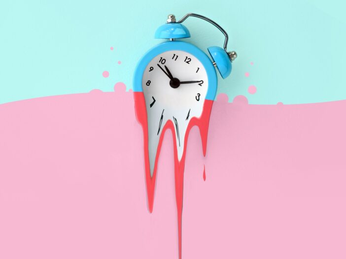 clock on pink and blue pink background