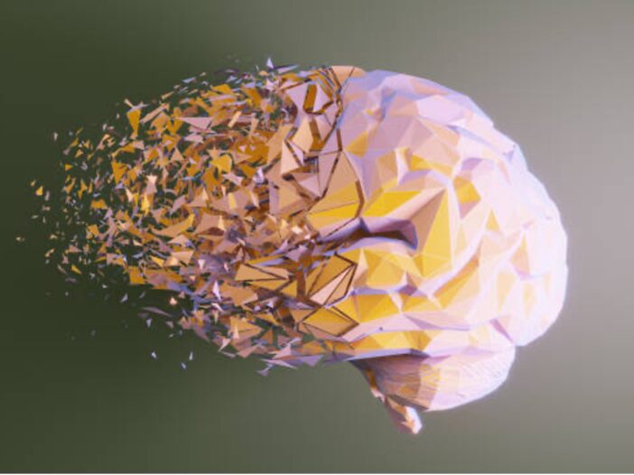 A digital rendering of a purple and yellow brain can be seen in front of a dark green background. The front of the brain dissipates while the back half remains intact.
