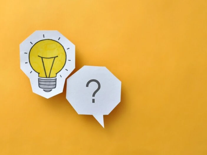 A light bulb and question mark illustration on a yellow background which is the header image for a blog post titled - How Social Security Decides If You Can Still Work in North Carolina