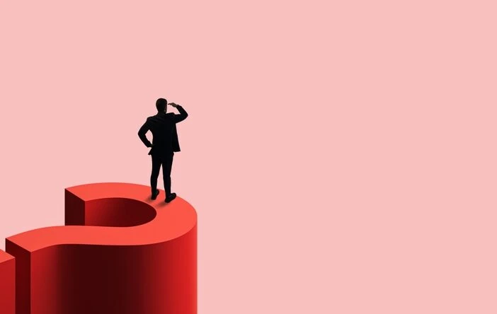 A header image for a blog post entitled "What Counts as Past Relevant Work in a North Carolina Disability Claim?" with a man in a suit standing on a red question mark and looking into a pink background.